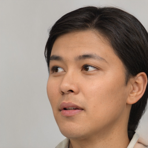 Neutral asian young-adult male with short  brown hair and brown eyes