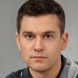 Neutral white young-adult male with short  brown hair and brown eyes