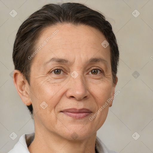 Joyful white middle-aged female with short  brown hair and brown eyes