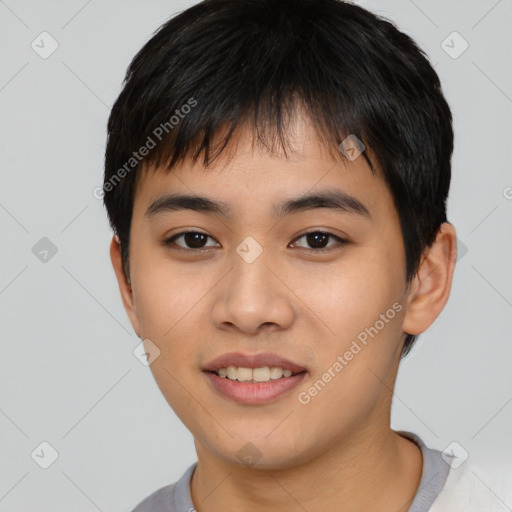 Joyful asian young-adult male with short  black hair and brown eyes