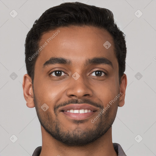 Joyful black young-adult male with short  brown hair and brown eyes