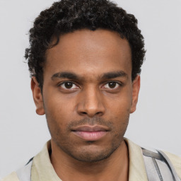 Neutral black young-adult male with short  brown hair and brown eyes