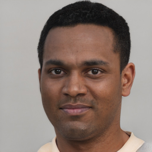 Neutral black young-adult male with short  black hair and brown eyes
