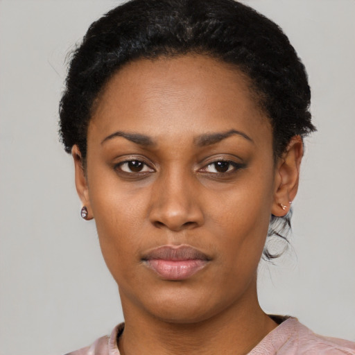 Neutral black young-adult female with short  black hair and brown eyes