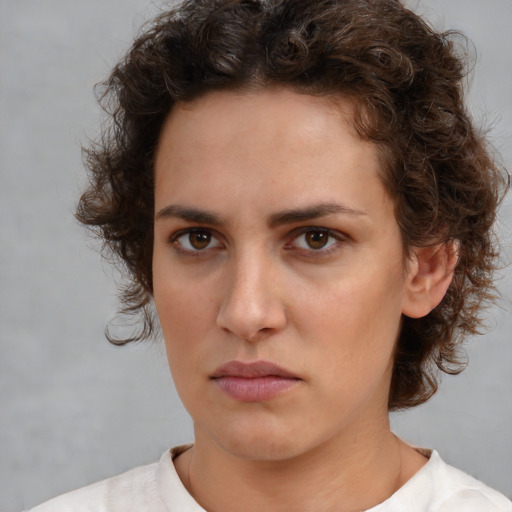 Neutral white young-adult female with short  brown hair and brown eyes