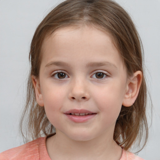 Joyful white child female with medium  brown hair and grey eyes