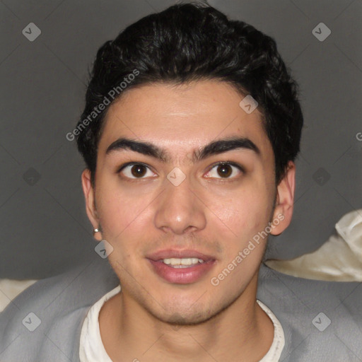 Joyful white young-adult male with short  black hair and brown eyes