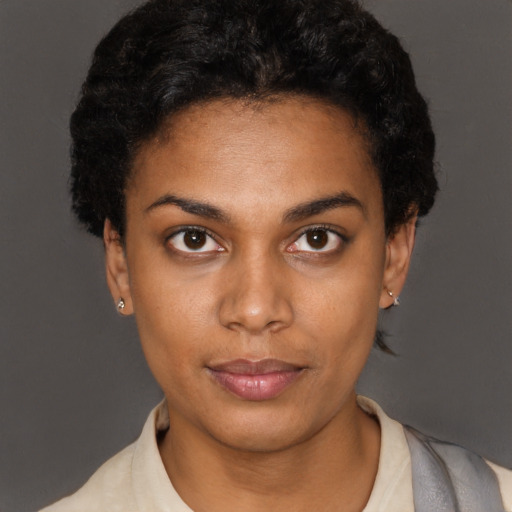 Neutral black young-adult female with short  brown hair and brown eyes