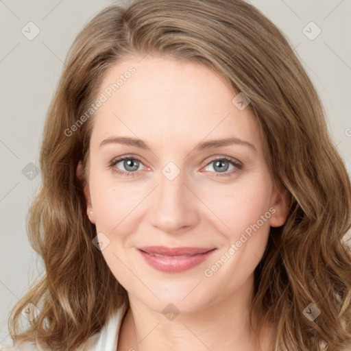 Joyful white young-adult female with medium  brown hair and green eyes