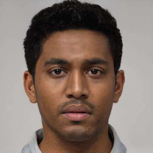 Neutral black young-adult male with short  black hair and brown eyes
