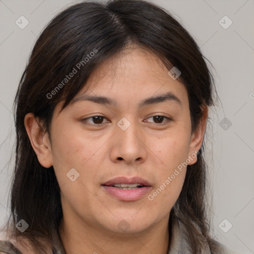 Joyful white adult female with medium  brown hair and brown eyes