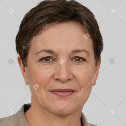 Joyful white adult female with short  brown hair and grey eyes