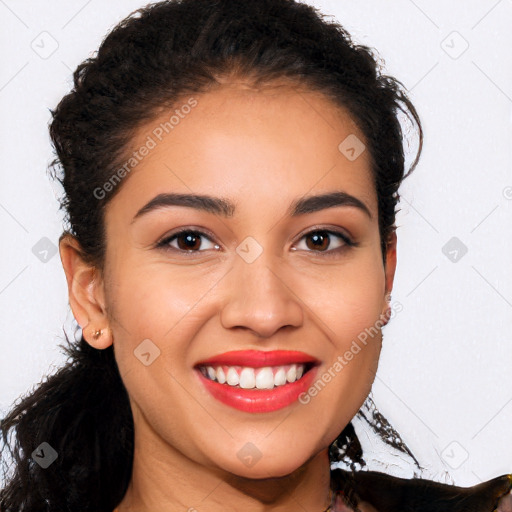 Joyful latino young-adult female with long  brown hair and brown eyes