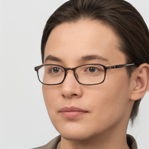 Neutral white young-adult female with medium  brown hair and brown eyes