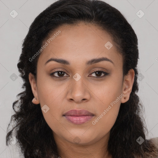 Joyful latino young-adult female with long  brown hair and brown eyes