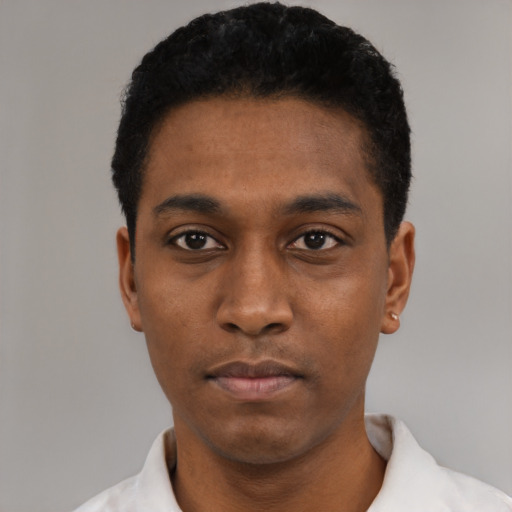Neutral black young-adult male with short  black hair and brown eyes