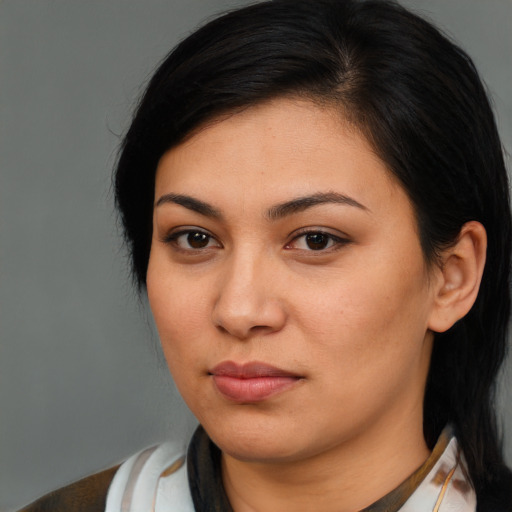 Neutral latino young-adult female with medium  brown hair and brown eyes