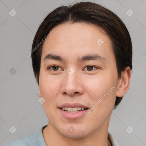 Joyful asian young-adult male with short  brown hair and brown eyes