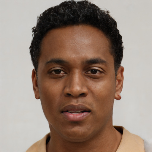 Neutral black young-adult male with short  black hair and brown eyes