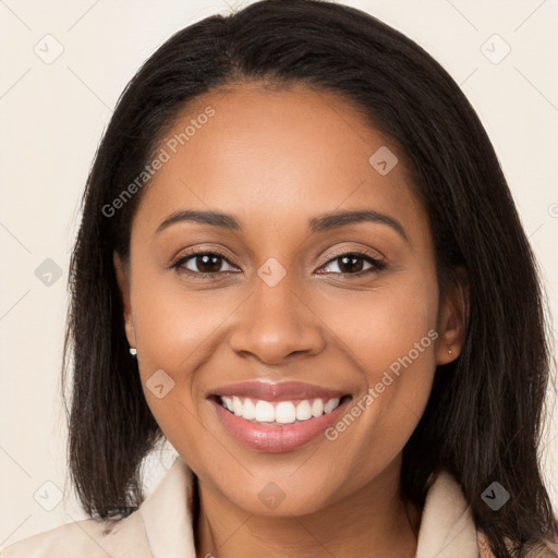 Joyful latino young-adult female with long  brown hair and brown eyes