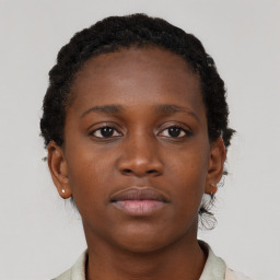 Neutral black young-adult female with short  brown hair and brown eyes