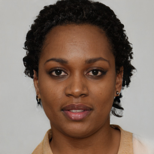 Neutral black young-adult female with short  brown hair and brown eyes