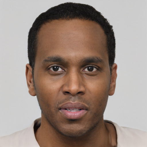 Neutral black young-adult male with short  black hair and brown eyes