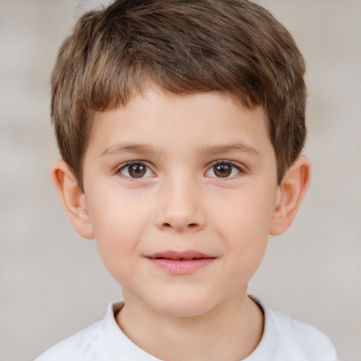 Joyful white child male with short  brown hair and brown eyes