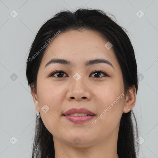 Joyful asian young-adult female with medium  black hair and brown eyes