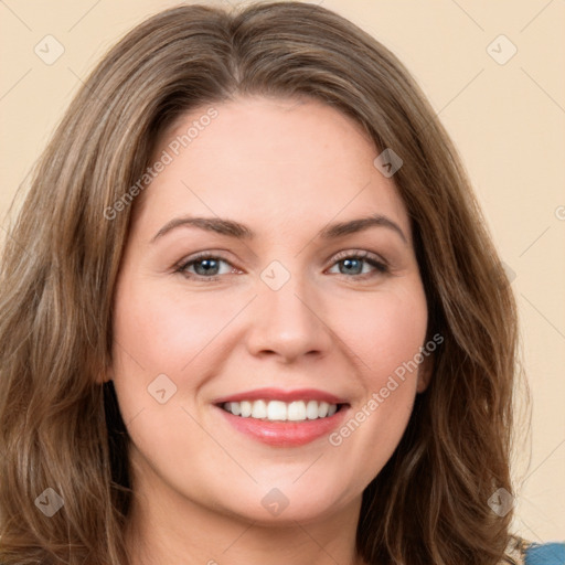 Joyful white young-adult female with long  brown hair and green eyes