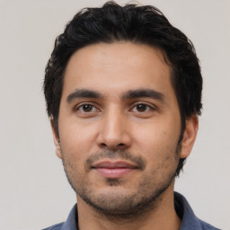 Neutral latino young-adult male with short  black hair and brown eyes