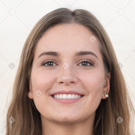 Joyful white young-adult female with long  brown hair and grey eyes