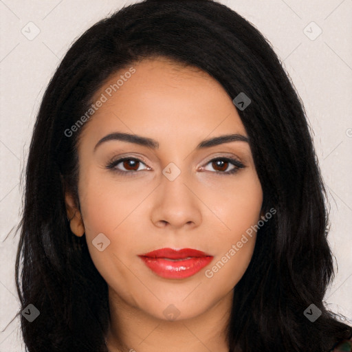 Joyful latino young-adult female with long  black hair and brown eyes