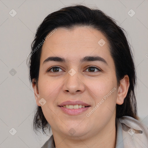 Joyful white young-adult female with medium  brown hair and brown eyes