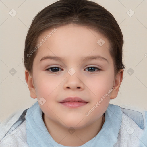 Joyful white child female with short  brown hair and brown eyes