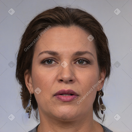 Joyful white adult female with medium  brown hair and grey eyes