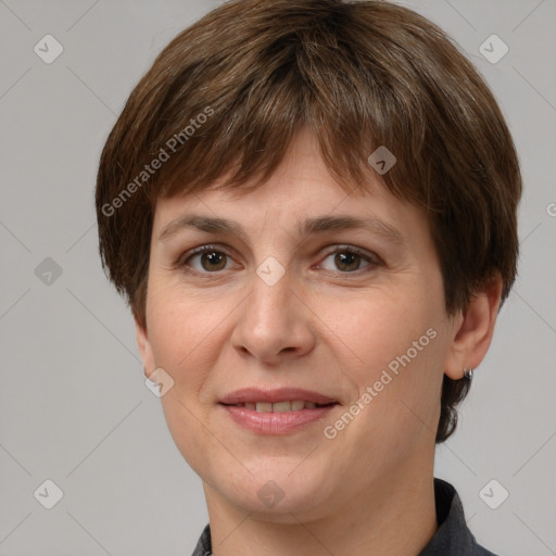 Joyful white adult female with medium  brown hair and brown eyes