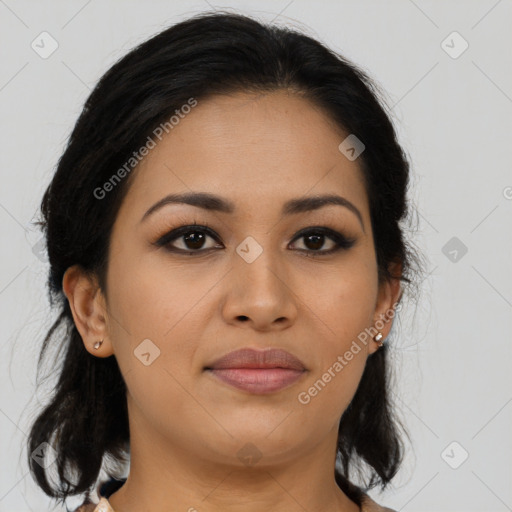 Joyful latino young-adult female with medium  brown hair and brown eyes