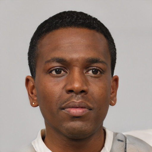 Neutral black young-adult male with short  black hair and brown eyes