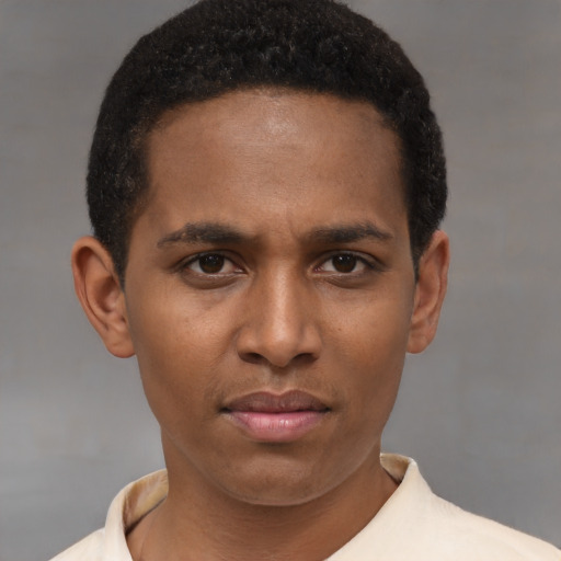 Neutral latino young-adult male with short  brown hair and brown eyes