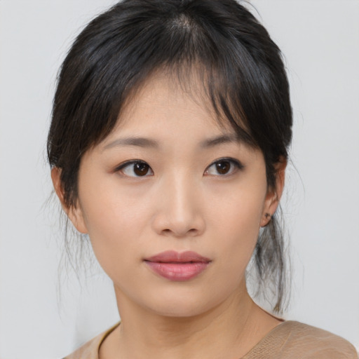 Neutral asian young-adult female with medium  brown hair and brown eyes
