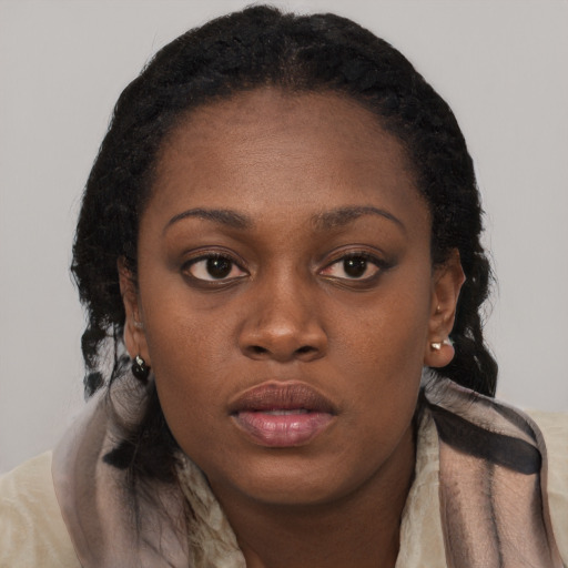 Neutral black young-adult female with short  brown hair and brown eyes