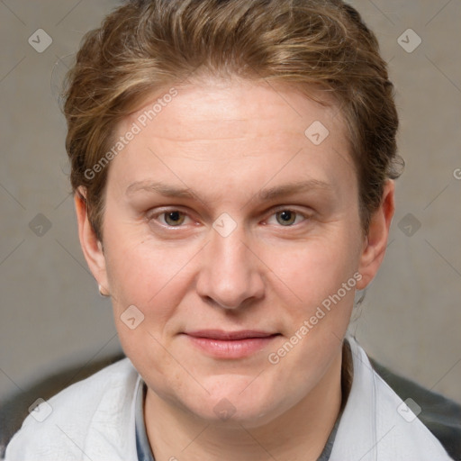 Joyful white adult female with short  brown hair and grey eyes