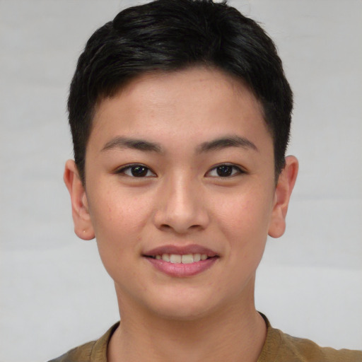 Joyful asian young-adult female with short  brown hair and brown eyes