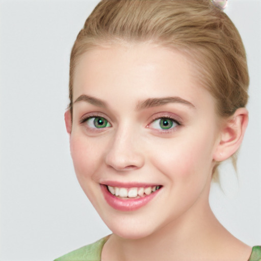 Joyful white young-adult female with medium  brown hair and green eyes