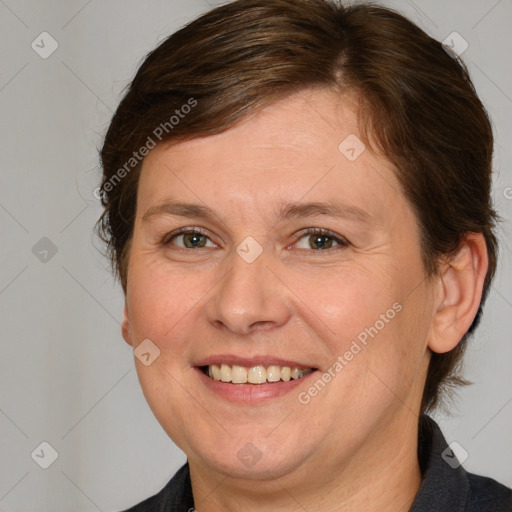 Joyful white adult female with medium  brown hair and blue eyes