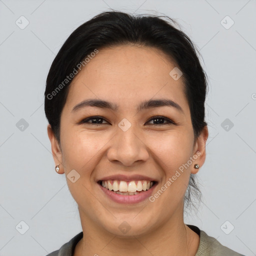 Joyful asian young-adult female with medium  brown hair and brown eyes