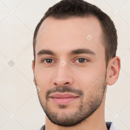 Neutral white young-adult male with short  brown hair and brown eyes