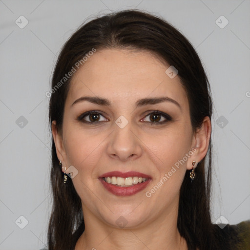 Joyful white young-adult female with long  brown hair and brown eyes