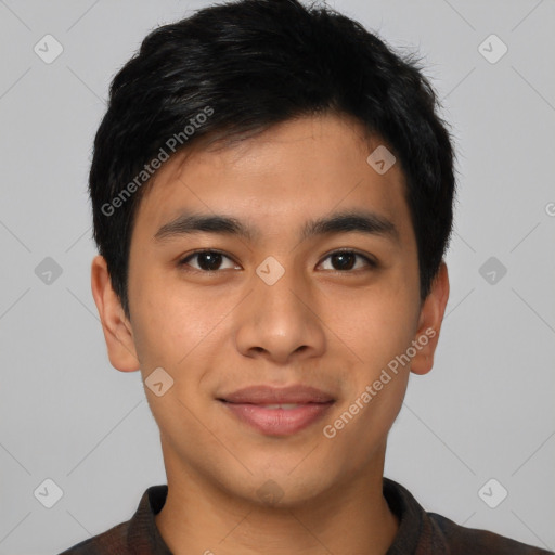 Joyful asian young-adult male with short  black hair and brown eyes